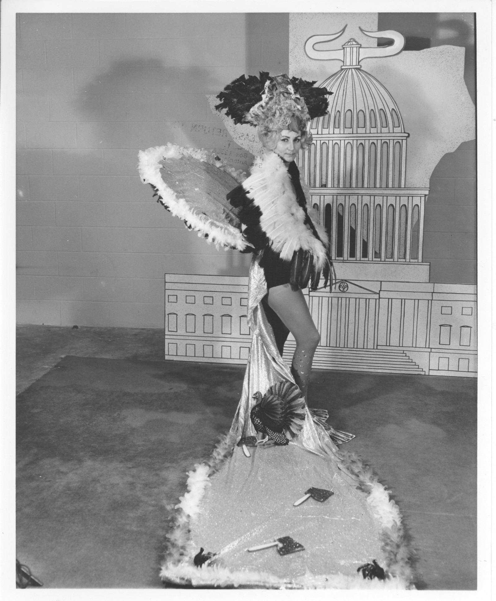Aubrey Davenport as Duchess of the Turkey Trot, 1965. This costume demonstrates the trains that were common as a part of the costuming in the 1950s and 1960s . Courtesy of The Playhouse and the San Antonio Public Library Texana Collection.