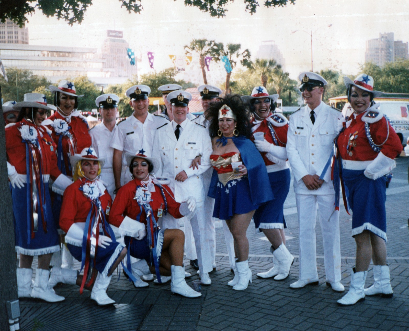 "Chicana Wonder Woman" Lisa Suarez flanked by Cornyation cast members and Russian soldiers